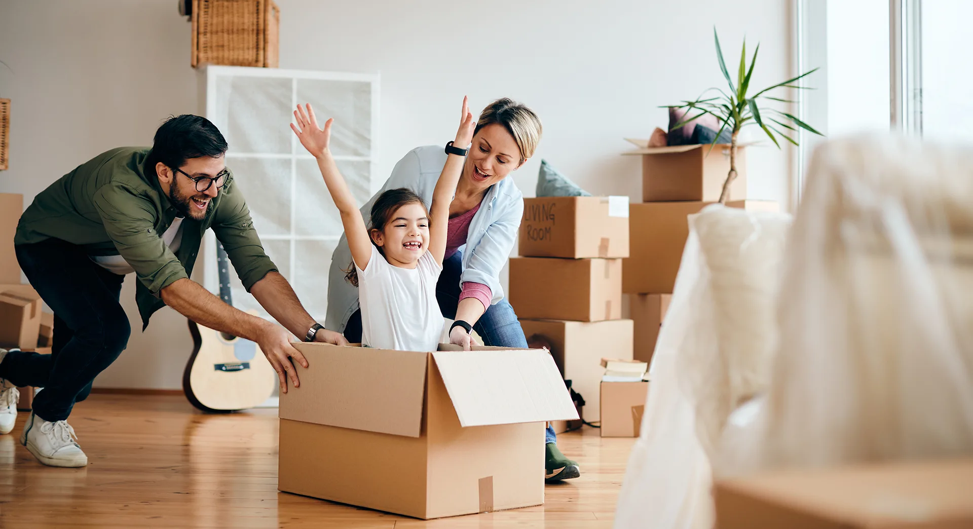 Happy Family after they moved into their new home